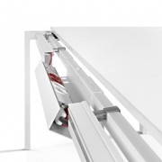 Cabling solution for sliding top single desks and desks with returns which makes assembly and installation easier and allows the user easy and convenient access to cables with a single movement. Top access lower tray included as standard as well as two cable management channels.