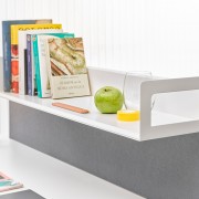 Metallic book tray compatible with S2 acoustic panels and melamine panels.